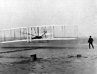 Here is the famous photo taken in 1903 of the first flight.