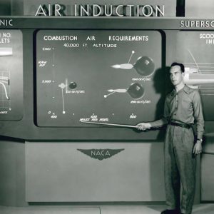 Man stands at Air Induction exhibit.