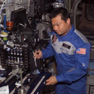 ISS Commander and Science Officer, Leroy Chiao performing BCAT-3 operations.