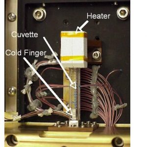 Image of the experimental setup. The CVB module opened. The thermocouples are embedded in the surface of the quartz. The cold finger is connected to the copper base plate to provide a large heat sink. Image courtesy of Glenn Research Center.