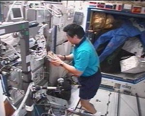 Video screen shot of ISS Commander and Science Officer, Leroy Chiao, performing DAFT operations on ISS during Expedition 10.