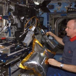 NASA Image: ISS013E69250 - Astronaut Jeffrey N. Williams, Expedition 13 NASA space station science officer and flight engineer, works with the dust and aerosol measurement feasibility test (DAFT) in the Destiny laboratory of the International Space Station.