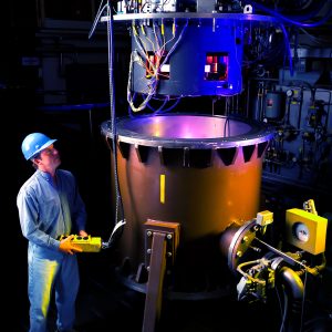 Image of a man working with the Dynamic Spin Rig at NASA's Glenn Research Center