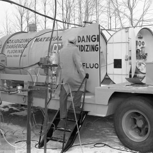 Man with tanker trailer.