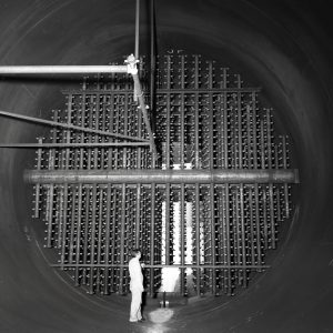 Man looking at spray bars in scrubber