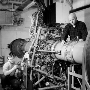 Researchers prepare an engine for testing in the SPL (1971)