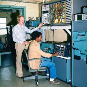 Researchers work with a phase shifter in the SPL (1979)