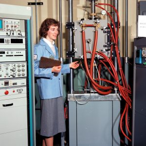 NASA researcher adjusts high temperature furnace in the SPL (1986)