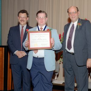 Spurlock receiving award.