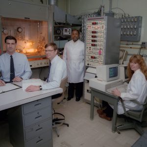 Four people in laboratory.