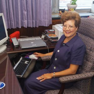 Gonzalez-Sanabria at desk.