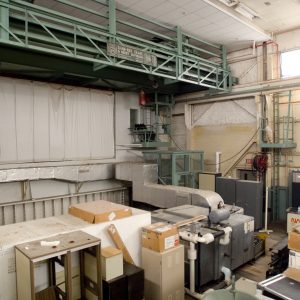 Interior of former AWT test chamber used as store room.