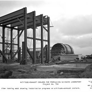 Early phases of construction in late December 1949. The steel structure to the left would support one of the large exhaust coolers. The shell of one of the coolers is sitting in the background.