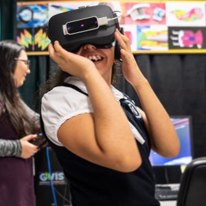 Student wearing Oculus lens