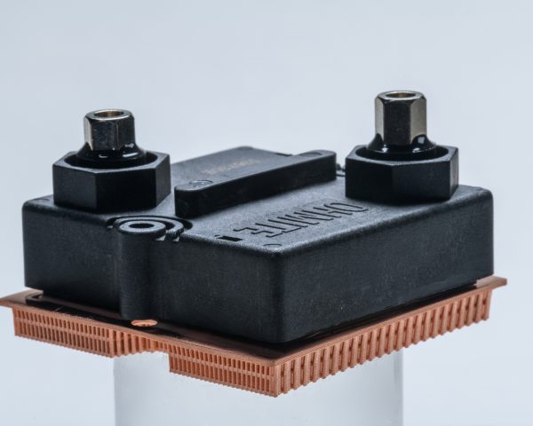 Image of a copper heat exchanger mounted to a resistor