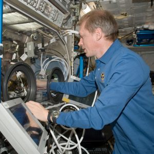 NASA Image: ISS020E026859 - European Space Agency astronaut Frank De Winne, Expedition 20 flight engineer, works with the InSPACE experiment in the Microgravity Science Glovebox in the Columbus laboratory of the International Space Station. (NASA)