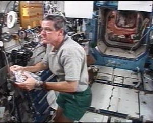 Video screenshot of Expedition 12 Science Officer William McArthur performing InSPACE coil monitor activity to verify the viability of the MR fluid. (NASA/Johnson Space Center)