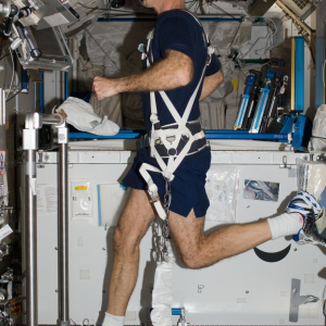NASA Astronaut Dan Burbank exercising in space