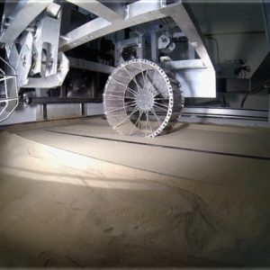 VIPER prototype wheel being tested on the TREC rig in GRC-3 lunar simulant.