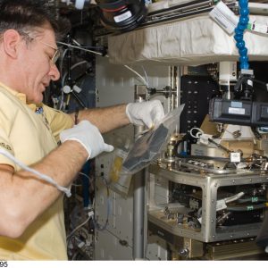NASA Image: ISS027E014895 - ESA astronaut Paolo Nespoli works with the Light Microscopy Module (LMM) in the Destiny laboratory of the International Space Station.