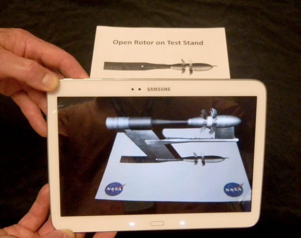 Tablet showing augmented reality display of open rotor jet engine