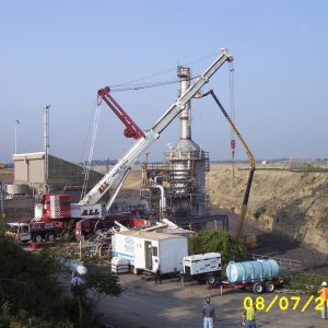 Cranes dismantle the RETF in August 2003.
